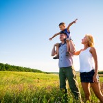 bigstock_happy_family_having_fun_outdoo_18400457 (2)